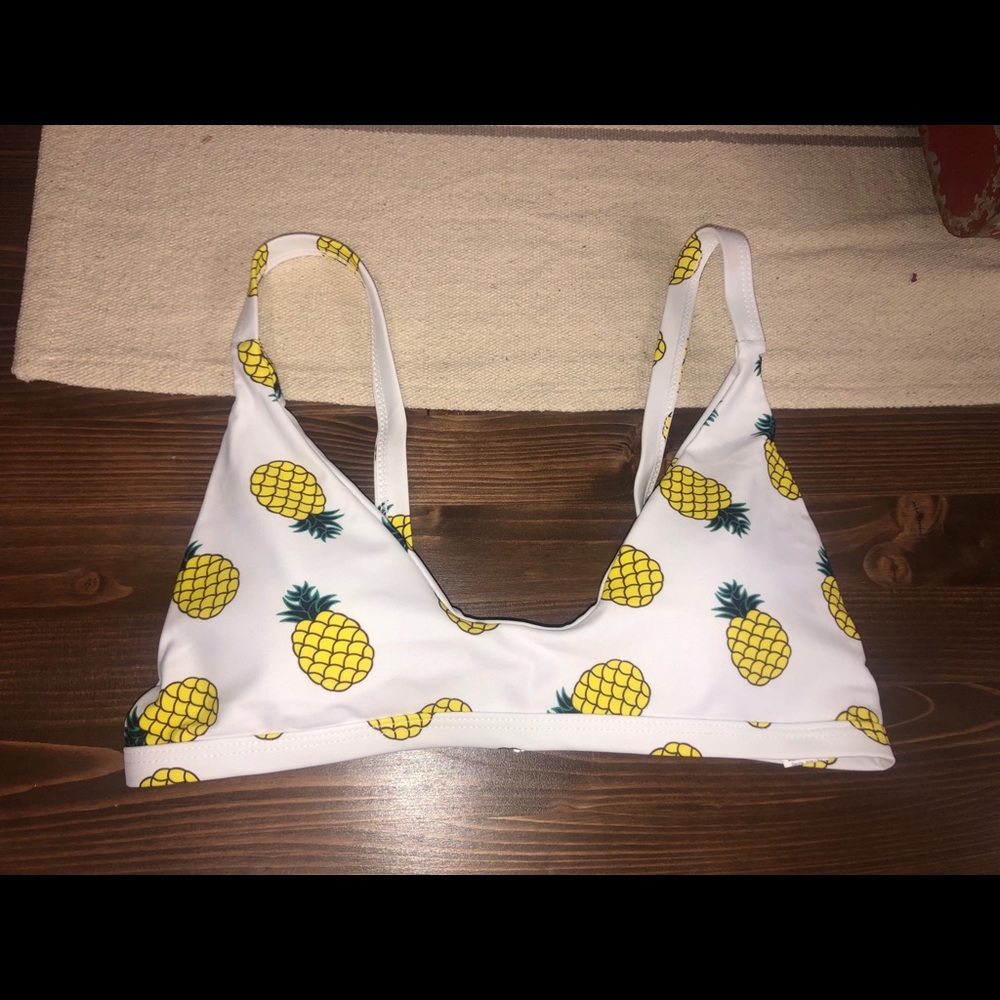 bathing suit top with pineapples on it